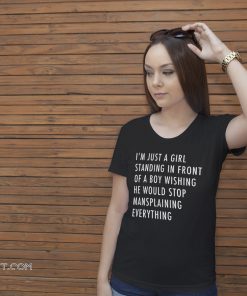 Just a girl standing front a boy wishing shirt
