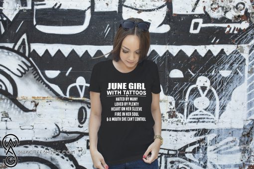 June girl with tattoos hated by many loved by plenty heart on her sleeve shirt
