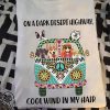 On a dark desert highway cool wind in my hair hippie girl with cats shirt
