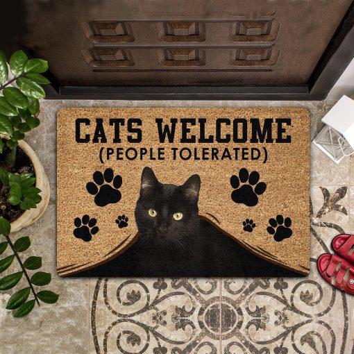 black cat welcome people tolerated doormat 1