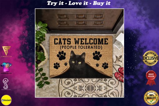 black cat welcome people tolerated doormat