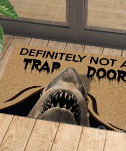 definitely not a trap door shark cat doormat 1