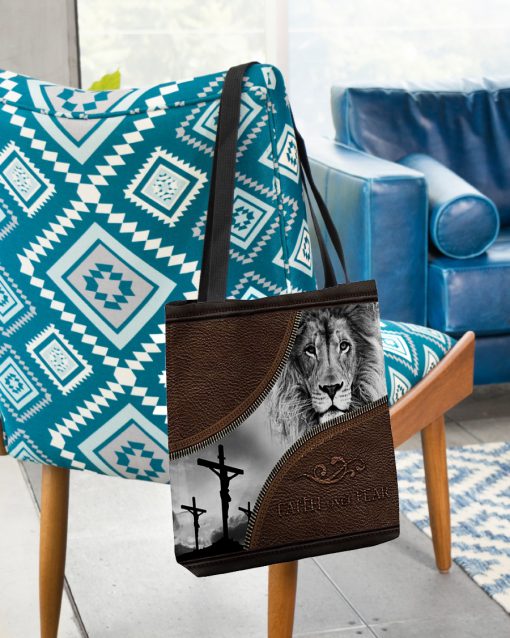 faith over fear lion Jesus leather pattern all over printed tote bag 2