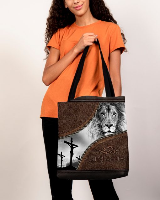 faith over fear lion Jesus leather pattern all over printed tote bag 5